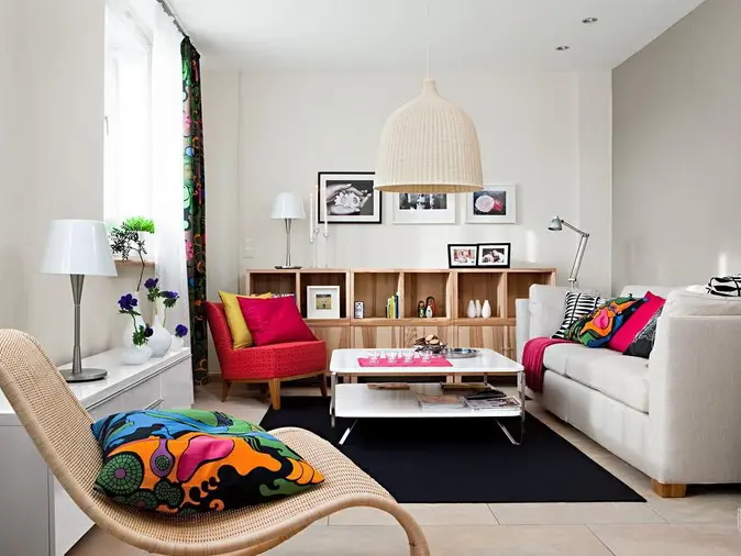 02-The-creamy-sofa-is-Stockholm-the-walls-are-white-to-create-a-cool-backdrop-for-colorful-touches.png