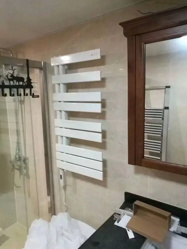 卫生间取暖怎么选风暖灯暖还是暖气片只要不用地暖怎样都好